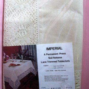 Imperial Lace Trimmed Tablecloth. 68 Inches by  122 Inches In Cream Color